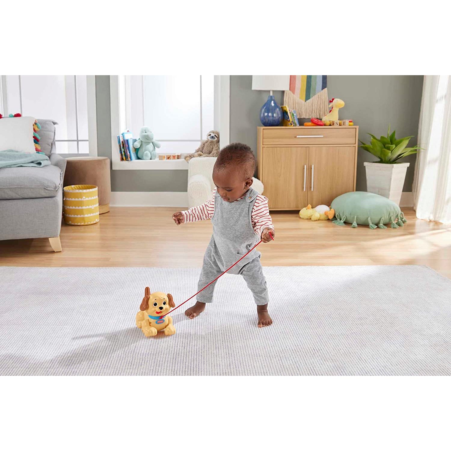 Fisher Price Lil' Snoopy, dog-themed pull toy for walking infants and toddlers