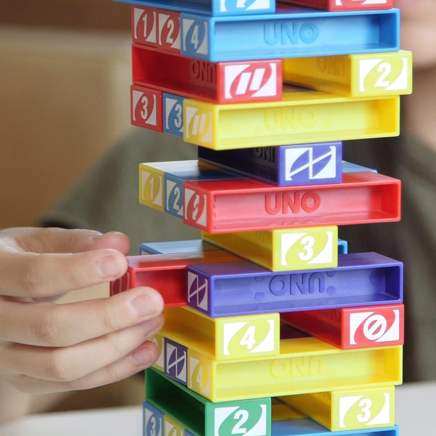 Mattel Games UNO StackoGame for Kids and Family with 45 Colored Stacking Blocks